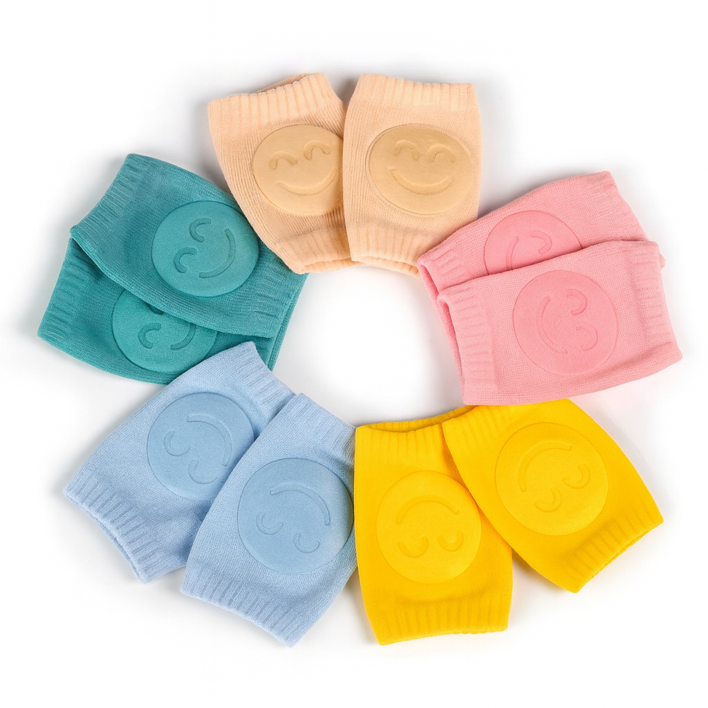 Set of colorful baby knee pads on a white background