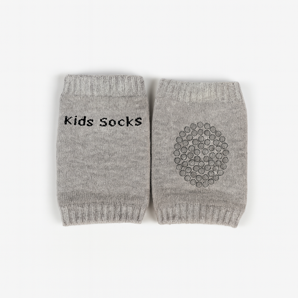 Pair of gray kids socks with 'kids socks' text on one and a pattern on the other, on a white background.