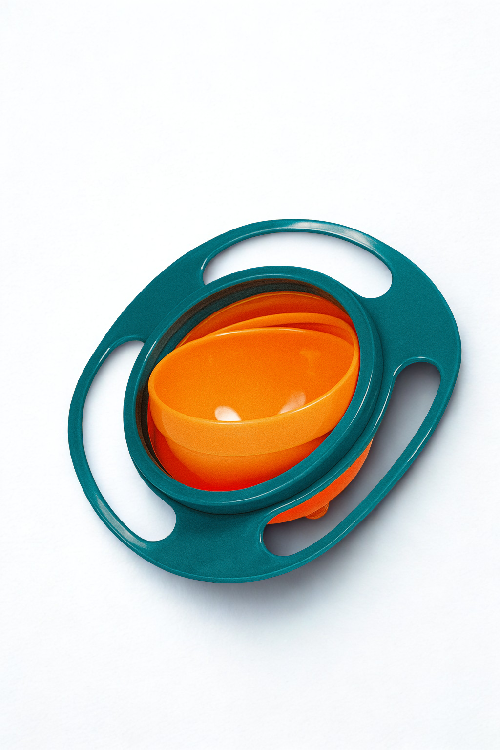 Teal and orange baby spoon with a white background