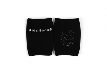 Two black socks with 'Kids Socks' text on a white background